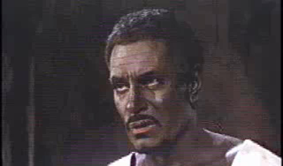 British actor Sir Laurence Olivier as Othello in blackface
